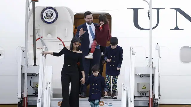 epaselect epa11885667 US Vice President JD Vance (top), his wife Usha Vance (L) and kids arrive at the Orly Airport near Paris, France, 10 February 2025, ahead of the Artificial Intelligence (AI) Action Summit. The summit takes place from 10 to 11 February. EPA/YOAN VALAT