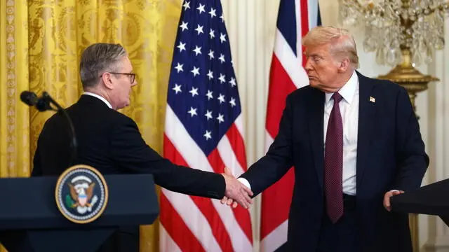 epa11928960 US President Donald Trump (R) with British Prime Minister Keir Starmer (L) during a press conference at the White House Washington, DC, USA, 27 February 2025. EPA/WILL OLIVER