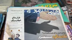 epa12040378 A copy of the Iranian daily newspaper Hamshahri, with the headline 'Trap of Straight Negotiations,' reporting about Iran and US nuclear talks, in a kiosk in Tehran, Iran, 19 April 2025. Iran and the USA were expected to hold a second round of nuclear talks on 19 April 2025, in Rome, Italy. EPA/ABEDIN TAHERKENAREH