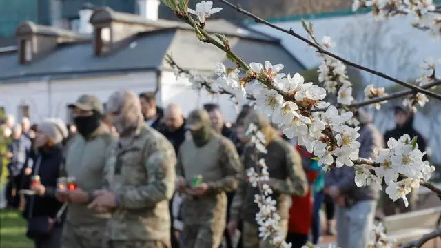 epa12025738 Ukrainians attend the 'Way of the Cross' religious procession for prisoners of war (POWs) held in Russian captivity, at St. Sophia's Cathedral in Kyiv, Ukraine, 11 April 2025, amid the Russian invasion. The procession included former POWs, displaced persons, and relatives of POWs and missing persons, with support from representatives of all traditional religious organizations of Ukraine. EPA/SERGEY DOLZHENKO