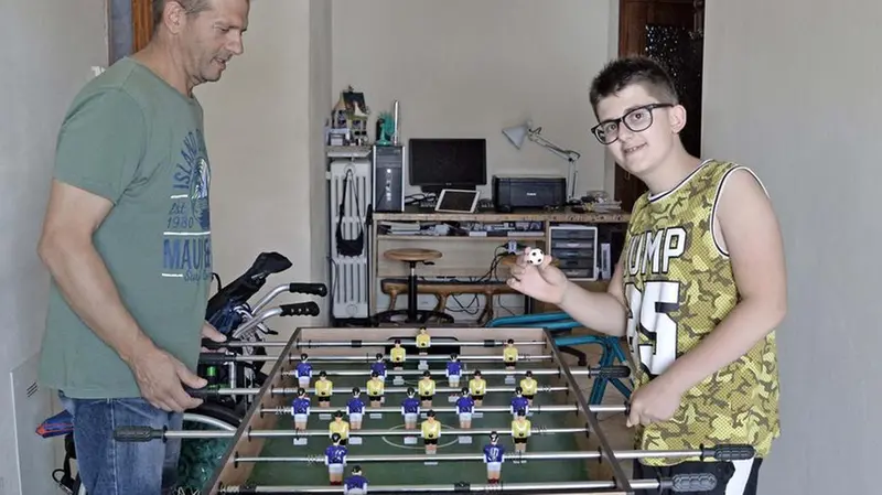 Marco Piccinelli con il papà - Foto Pierre Putelli/Neg © www.giornaledibrescia.it