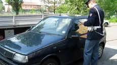 MILANO 02/05/04-OMICIDIO STRADALE TRA VIA PADOVA E VIA ANACRONTE- LA VETTURA DEI RAGAZZI FERITI MORTALMENTE FOTO MARMORINO/GUATELLI