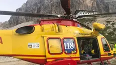 epa07813182 A handout picture provided by the 118 shows a a rescue helicopter on a previous attempt to rescue two Spanish climbers that have been stuck for three days on a Dolomite peak but twice refused help, Auronzo (Belluno), Northern Italy, 02 September 2019. On the third attempt the man and woman from Barcelona accepted help. They were saved by helicopter at an altitude of 2,750 metres and taken to safety. EPA/118 REGIONE VENETO / HANDOUT HANDOUT EDITORIAL USE ONLY/NO SALES