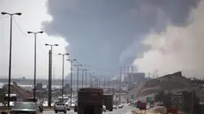 epa12056323 â€‹Smoke rises from an explosion at the Rajaie port in the city of Bandar Abbas, southern Iran, 26 April 2025. Iranian state media reported on 26 April several injuries in an explosion at the port, but authorities have not yet announced the cause. EPA/Mohammad Rasoul Moradi