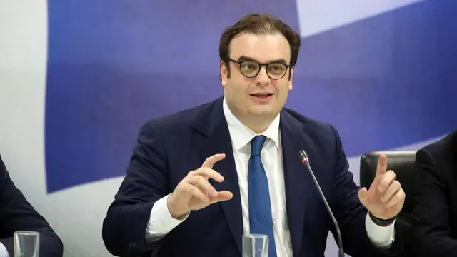 epa11965873 Greek new Finance minister Kyriakos Pierrakakis speaks during a handover ceremony at the Finance Ministry in Athens, Greece, 15 March 2025. EPA/ALEXANDROS VLACHOS