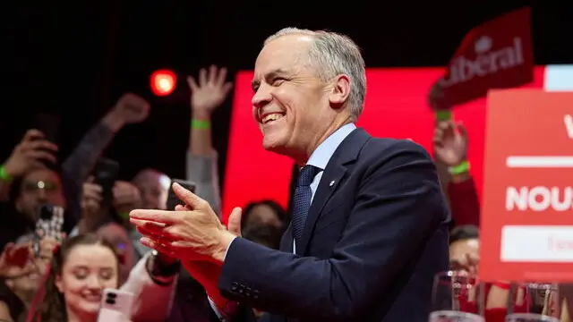epaselect epa12061719 Canadian Prime Minister Mark Carney celebrates his election win at the Liberal Party election night event in Ottawa, Ontario, Canada, 28 April 2025. Carney was elected prime minister after Canadians went to the polls earlier in the day. EPA/ERIC REID