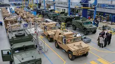 epa11969903 Military off-road vehicles are seen on the assembly line of Spanish company Urovesa, which specializes in the design and manufacture of Armed Forces' vehicles, in Valga, north-western Spain, 17 March 2025. Spain's Prime Minister Pedro Sanchez stated on 11 March 2025 that he is willing to reach 2 percent of GDP in military spending by next year, before 2029, and reaffirmed support for the EU's 'ReArm Europe' defense plan, saying the arms race will also provide an opportunity to reindustrialize Spain and the continent. With about 1.28 percent spent on defense last year, Spain is proportionally one of the lowest NATO defense spenders. EPA/LAVANDEIRA JR