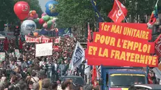 Some 30 to 40,000 people demonstrate for May day from Bastille to Republique in Paris, 01 May. Banner right reads : "Unity for employment and fraternity on 1st May".