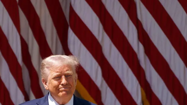 epaselect epa12068043 US President Donald Trump attends the National Day of Prayer Event in the Rose Garden of the White House in Washington, DC, USA, 01 May 2025. EPA/WILL OLIVER