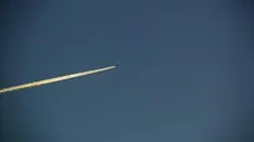 Un'immagine dell'alba russa che sorge su Sebastopoli con gli aerei che sfrecciano nel cielo, 24 Marzo 2014. ANSA/ CLAUDIO ACCOGLI