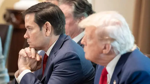 epa12065951 US Secretary of State Marco Rubio (L) listens during a cabinet meeting held by US President Donald Trump (R), in the Cabinet Room of the White House in Washington, DC, USA, 30 April 2025. EPA/KEN CEDENO / POOL