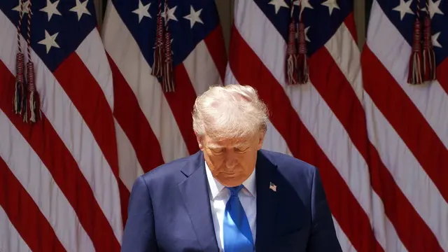epaselect epa12068048 US President Donald Trump attends the National Day of Prayer Event in the Rose Garden of the White House in Washington, DC, USA, 01 May 2025. EPA/WILL OLIVER