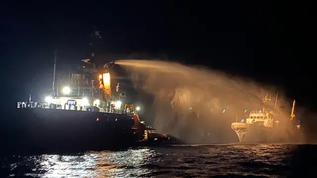 epa12069186 A handout photo made available by the Malta Government Department of Information (DOI) shows a tug vessel contacted by the Malta Vessel Traffic Services (VTS) extinguishing a fire on the ship Conscience in international waters, 02 May 2025. Maltese authorities said in a statement that all 16 people aboard, 12 crew and four passengers, were safe after receiving a distress call about a fire on the bow of the vessel outside Maltese territorial waters. The ship remained in international waters and was being monitored by authorities. Activists from the Freedom Flotilla Coalition claimed their ship Conscience, carrying aid intended for Gaza, was struck by drones. EPA/GOVERNMENT OF MALTA HANDOUT -- MANDATORY CREDIT: GOVERNMENT OF MALTA -- BEST QUALITY AVAILABLE -- HANDOUT EDITORIAL USE ONLY/NO SALES