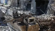 epa11960778 A damaged building following an Israeli airstrike in the suburbs of Dummar, outskirts of Damascus, Syria, 13 March 2025. Israel confirmed on 13 March its air force had conducted strikes on targets in Damascus, believed to be Palestinian Islamic Jihad command centers. EPA/MOHAMMED AL RIFAI