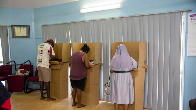 epa12045958 People cast their votes in a remote polling station in Pirlangimpi, Melville Island, Northern Territory, Australia, 22 April 2025. Australia is set to hold elections on 03 May 2025 to elect members of the federal parliament. EPA/AARON BUNCH NO ARCHIVING AUSTRALIA AND NEW ZEALAND OUT
