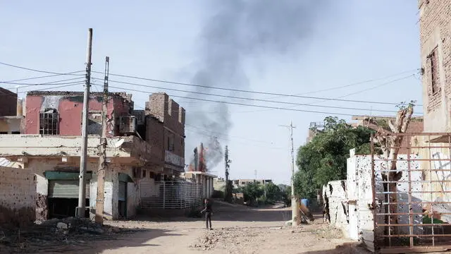 epa11700429 Flames and smoke rise from a building in Omdurman, Sudan, 02 November 2024 (issued 04 November 2024). On 02 November, Omdurman was under the control of the Sudanese Armed Forces. A civil war broke out April 2023 between the Sudanese military led by army chief Abdel Fattah al-Burhan, and the paramilitary Rapif Support Forces (RSF) led by Mohamed Hamdan Dagalo, the former Deputy Chairman of the Transitional Sovereignty Council of Sudan.The International Office for Migration (IOM) estimates that spme eight million people have been displaced internally or to neighbouring countries since April 2023. EPA/Sara Creta