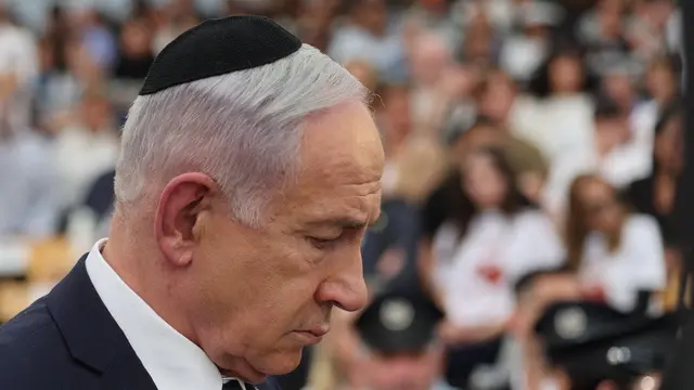 epa12062690 Israeli Prime Minister Benjamin Netanyahu during the annual ceremony at the eve of Israelâ€™s Remembrance Day for fallen soldiers (Yom HaZikaron) at the Yad LaBanim Memorial in Jerusalem, 29 April 2025. Israel marks Yom HaZikaron, the 'Memorial Day for the Fallen Soldiers of Israel and Victims of Terrorism'. EPA/ABIR SULTAN / POOL
