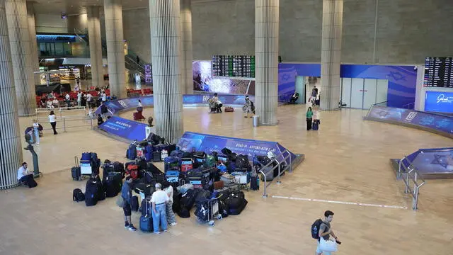 epa11579196 Passengers wait at the arrivals terminal at the Ben Gurion International Airport after Israeli trade unionist and chairman of Histadrut, Arnon Bar-David, announced a general strike; in Tel Aviv, Israel, 02 September 2024. Israel's largest labor union, Histadrut, called for a nationwide general strike to start on 02 September urging the Israeli Prime Minister to reach a deal to secure the remaining hostages held by Hamas following the 07 October attack. Thousands of Israelis protested across Israel on 01 September following the recovery of the bodies of six hostagres held by Hamas in the Gaza Strip. According to a statement by the Israeli Government Press Office, 97 Israeli hostages remain in captivity in the Gaza Strip, with 33 confirmed dead. EPA/ABIR SULTAN