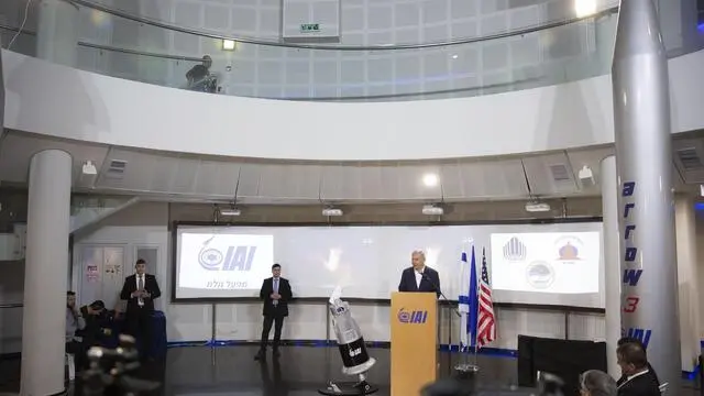 epa07309384 Israel Prime Minister Benjamin Netanyahu speaks at the Israel Aerospace Industries (IAI) MLM Division plant in Be'er Ya'akov, Israel, 22 January 2019. According to reports, Israel has successfully tested the Arrow-3 Anti-ballistic Missile System. EPA/TOMER APPELBAUM / HAARETZ POOL