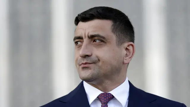 epa12073545 Ultra-nationalist party AUR leader George Simion attends a press conference with foreign media journalists held outside the Parliament Palace, on repeated presidential elections, first round, in Bucharest, Romania, 04 May 2025. Crin Antonescu is ranked second in the repeated presidential race. Approximately 18 million Romanian citizens are expected at the polling stations, according to the Permanent Electoral Authority (AEP). EPA/ROBERT GHEMENT