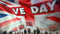 epa12074520 A VE Day flag on Whitehall ahead of a military procession to commemorate the 80th anniversary of Victory in Europe (VE Day) in London, Britain, 05 May 2025. Around 1,000 UK service personnel from the Royal Navy, the Royal Marines, the British Army and the Royal Air Force will join the procession, including personnel from the Ukrainian armed forces who have been deployed to the UK on Operation Interflex. EPA/ANDY RAIN