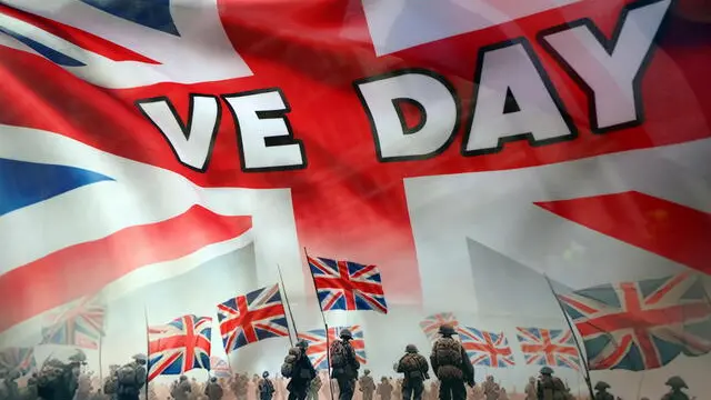 epa12074520 A VE Day flag on Whitehall ahead of a military procession to commemorate the 80th anniversary of Victory in Europe (VE Day) in London, Britain, 05 May 2025. Around 1,000 UK service personnel from the Royal Navy, the Royal Marines, the British Army and the Royal Air Force will join the procession, including personnel from the Ukrainian armed forces who have been deployed to the UK on Operation Interflex. EPA/ANDY RAIN