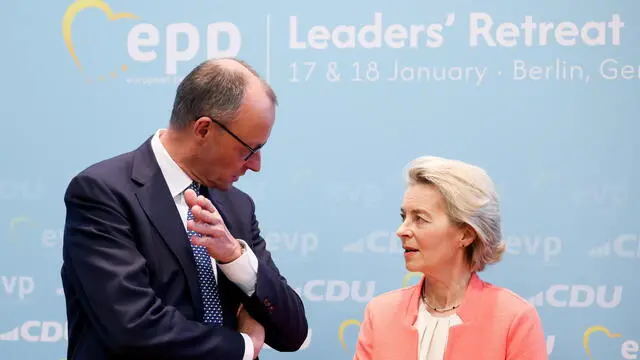 epa11831363 Chairman of Germany's Christian Democratic Union (CDU) Friedrich Merz (L) talks to European Commission President Ursula von der Leyen before a meeting of the European People's Party (EPP) in Berlin, Germany, 17 January 2025. EPA/FILIP SINGER