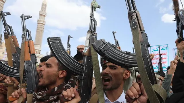 epa12054848 Houthi supporters shout slogans and hold up their weapons during a protest against the United States, in Sana'a, Yemen, 25 April 2025. Thousands of Houthi supporters took to the streets of Sana'a to protest against US airstrikes targeting several Yemeni cities since mid-March. The Houthis have launched several attacks with more than 20 drones and missiles against US military vessels in the Red Sea and shot down three US Army MQ-9 Reaper drones over Yemen in the last week, Houthi leader Abdul-Malik al-Houthi said in a televised speech. EPA/YAHYA ARHAB
