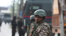 epa12079149 Indian security forces patrol a road in Pampore, in the outskirts of Srinagar, India, 07 May 2025. On 07 May, the Indian Armed Forces launched 'Operation Sindoor', hitting alleged terrorist infrastructure in Pakistan and Pakistan-occupied Jammu and Kashmir. EPA/FAROOQ KHAN