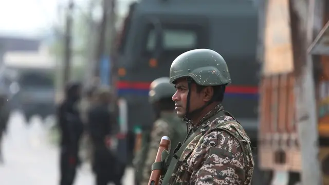 epa12079149 Indian security forces patrol a road in Pampore, in the outskirts of Srinagar, India, 07 May 2025. On 07 May, the Indian Armed Forces launched 'Operation Sindoor', hitting alleged terrorist infrastructure in Pakistan and Pakistan-occupied Jammu and Kashmir. EPA/FAROOQ KHAN