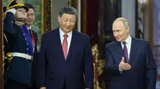 epa12082746 Russian President Vladimir Putin (R) and China's President Xi Jinping (C) attend their meeting at the Kremlin in Moscow, Russia, 08 May 2025. Russia will mark the 80th anniversary of the victory in World War II over Nazi Germany and its allies on 09 May. EPA/YURI KOCHETKOV / POOL