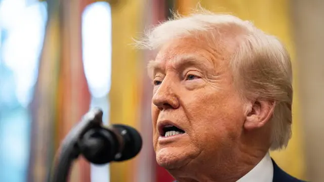 epa12081949 US President Donald Trump answers questions from reporters after former US Senator David Perdue (not pictured) was sworn in as the United States Ambassador to the Peoples Republic of China during a ceremony in the Oval Office at the White House in Washington, DC, USA, 07 May 2025. EPA/SAMUEL CORUM / POOL