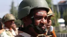 epa11599538 Indian paramilitary soldiers stand guard as Indian member of parliament Sheikh Abdul Rashid, commonly known as Engineer Rashid, leaves the airport in Srinagar, the summer capital of Indian Kashmir, 12 September 2024. Rashid, who has been imprisoned since his arrest on August 2019 in a case related to terror funding, was released from Tihar Jail in Delhi after a court granted him bail until 02 October 2024, allowing him to campaign for his Awami Ittehad Party (AIP) for the upcoming Jammu and Kashmir Assembly elections, which are scheduled to be held in three phases on 18 September, 25 September and 01 October. Rashid earlier this year won the election to the Indian Parliament from jail, defeating former Jammu and Kashmir Chief Minister Omar Abdullah. EPA/FAROOQ KHAN