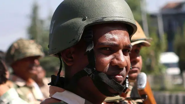 epa11599538 Indian paramilitary soldiers stand guard as Indian member of parliament Sheikh Abdul Rashid, commonly known as Engineer Rashid, leaves the airport in Srinagar, the summer capital of Indian Kashmir, 12 September 2024. Rashid, who has been imprisoned since his arrest on August 2019 in a case related to terror funding, was released from Tihar Jail in Delhi after a court granted him bail until 02 October 2024, allowing him to campaign for his Awami Ittehad Party (AIP) for the upcoming Jammu and Kashmir Assembly elections, which are scheduled to be held in three phases on 18 September, 25 September and 01 October. Rashid earlier this year won the election to the Indian Parliament from jail, defeating former Jammu and Kashmir Chief Minister Omar Abdullah. EPA/FAROOQ KHAN