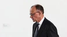 epa12083919 German Chancellor Friedrich Merz arrives for his meeting with the multilateral youth camp Youth4Peace movement in Berlin, Germany, 08 May 2025. EPA/FILIP SINGER