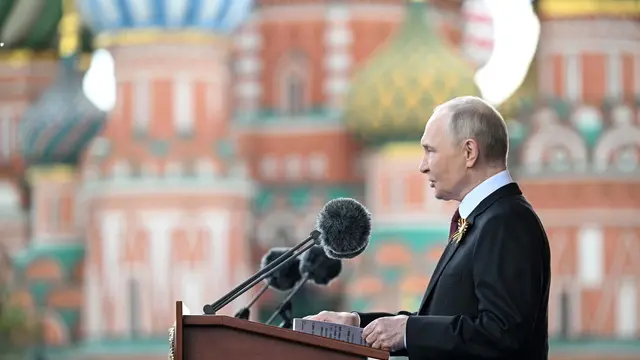 epa12085494 A handout photo made available by Photo host Agency RIA Novosti shows President of Russia Vladimir Putin delivering his speech during the Victory Day military parade, marking the 80th anniversary of victory in the Great Patriotic War, on the Red Square in Moscow, Russia, 09 May 2025. Russia marks the 80th anniversary of the victory in World War II over Nazi Germany and its allies. The Soviet Union lost 27 million people in the war. EPA/SERGEY BOBYLEV /HOST PHOTO AGENCY RIA NOVOSTI / HANDOUT HANDOUT EDITORIAL USE ONLY/NO SALES