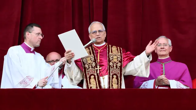 Cardinal Robert Francis Prevost blesses from a balcony of St Peter's Basilica after his election as the 267th pope of the Roman Catholic church, Vatican City, 08 May 2025. ANSA/ETTORE FERRARI