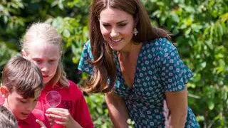 epa07687653 Britain's Catherine, Duchess of Cambridge visits The Back To Nature Garden with children during the press day of the RHS Hampton Court Palace Garden Festival in London, Britain, 01 July 2019. The RHS Hampton Court Palace Garden Festival is a garden show held for five days by the Royal Horticultural Society in the grounds of Hampton Court Palace and runs this year from 02 July to 07 July. EPA/VICKIE FLORES