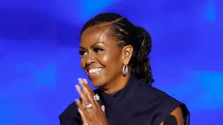 epa11557477 Former First Lady of the US Michelle Obama speaks during the second night of the Democratic National Convention (DNC) at the United Center in Chicago, Illinois, USA, 20 August 2024. The 2024 Democratic National Convention is being held from 19 to 22 August 2024, during which delegates of the United States' Democratic Party will vote on the party's platform and ceremonially vote for the party's nominee for president, Vice President Kamala Harris, and for vice president, Governor Tim Walz of Minnesota, for the upcoming presidential election. EPA/CAROLINE BREHMAN
