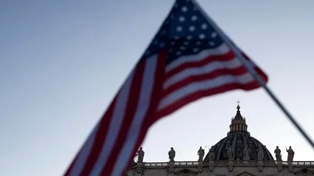 US flags for the election of Pope Leo XIV, Cardinal Robert Francis Prevost from the USA, addressing faithfuls from the central loggia of Saint Peter's Basilica, in Vatican City, 08 May 2025. ANSA/ANGELO CARCONI
