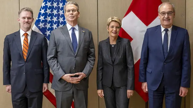 epa12086669 US Trade Representative Jamieson Greer (L), US Secretary of the Treasury Scott Bessent (2-L), Switzerland's President Karin Keller-Sutter (2-R), and Switzerland's Economy Minister Federal Councillor Guy Parmelin (R) pose during a bilateral meeting between Switzerland and the United States, in Geneva, Switzerland, 09 May 2025. EPA/MARTIAL TREZZINI