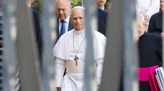 Pope Leo XIV walks inside the Vatican at the end of a meeting with cardinals, Vatican City 10 May 2025. ANSA/FABIO FRUSTACI