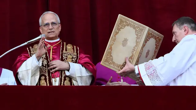 Cardinal Robert Francis Prevost blesses from a balcony of St Peter's Basilica after his election as the 267th pope of the Roman Catholic church, Vatican City, 08 May 2025. ANSA/ETTORE FERRARI