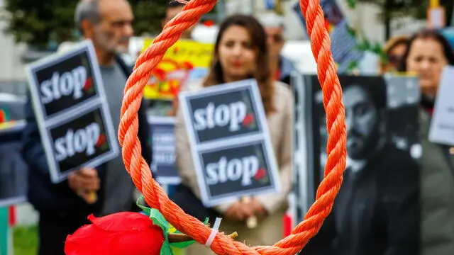 epa11652785 Members of the Iranian community in Belgium, supported by the National Council of Resistance of Iran (NCRI), call on EU leaders to join the campaign to stop executions in Iran, during a rally on the occasion of the World Day Against the Death Penalty, in front of the European Parliament in Brussels, Belgium, 10 October 2024. EPA/OLIVIER MATTHYS