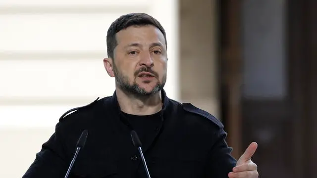 epa12089003 Ukraine's President Volodymyr Zelensky gestures as he addresses a joint press conference following a meeting of the 'Coalition of the willing' at the Mariinskyi Palace, the official residence of the president of Ukraine, in Kyiv, Ukraine, 10 May 2025, amid the ongoing Russian invasion. EPA/SERGEY DOLZHENKO