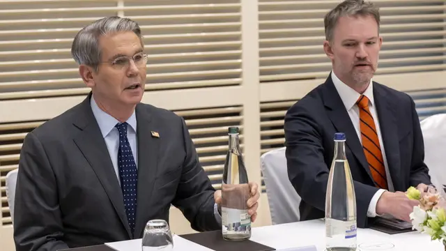 epa12086719 US Secretary of the Treasury Scott Bessent (L), and US Trade Representative Jamieson Greer (R) listen to the speeches, during a bilateral meeting between Switzerland and the United States, in Geneva, Switzerland, 09 May 2025. EPA/MARTIAL TREZZINI
