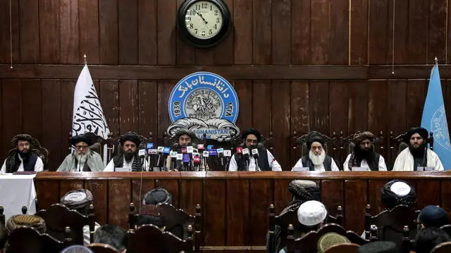 epa11974519 Taliban's Ministry of Finance and The Afghanistan Bank officials attend a press conference in Kabul, Afghanistan, 19 March 2025. The Afghanistan Bank and the Taliban's Ministry of Finance have entered into an agreement to connect their payment systems, a collaboration aimed to improve transparency in revenue collection and facilitate electronic government spending, the bank management said. EPA/SAMIULLAH POPAL