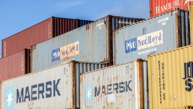 epa12084332 Shipping containers are stacked at a container terminal near the Miami International Airport in Miami, Florida, USA, 08 May 2025. During his second presidency, US President Donald Trump significantly expanded the use of protective tariffs, intensifying his 'America First' trade program. These tariffs were designed to shield US industries from foreign competition, particularly targeting countries like China, but also extending to allies such as Canada, Mexico, and European nations. EPA/CRISTOBAL HERRERA-ULASHKEVICH