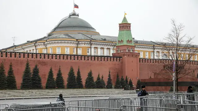 epa11240589 Russian policemen guard the closed entrance to the Red Square, following a terrorist attack on the Crocus City hall concert venue, in Moscow, Russia, 24 March 2024. Russia started a day of national mourning for the victims of the terrorist attack in Crocus City Hall in Krasnogorsk. On 22 March, a group of gunmen attacked the Crocus City Hall in the Moscow region, Russian emergency services said. According to the latest data from the Russian Investigative Committee, 152 people died and more than 100 were hospitalized. On the morning of 23 March, the director of the Russian FSB, Alexander Bortnikov, reported to Russian President Vladimir Putin about the detention of 11 people, including all four terrorists directly involved in the terrorist attack. EPA/SERGEI ILNITSKY