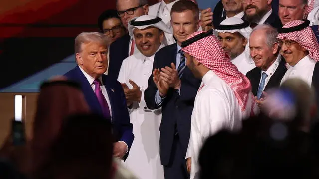 epa12096719 US President Donald Trump (L) attends the Keynote Address at the Saudi-US Investment Forum in Riyadh, Saudi Arabia, 13 May 2025. The forum is taking place during the state visit of US President Trump to Saudi Arabia on 13 May. EPA/ALI HAIDER